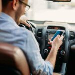 Distracted drivers using cell phone while driving