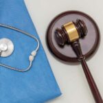 Personal injury cases illustration showing stethoscope and gavel