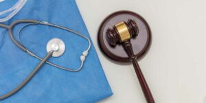 Personal injury cases illustration showing stethoscope and gavel